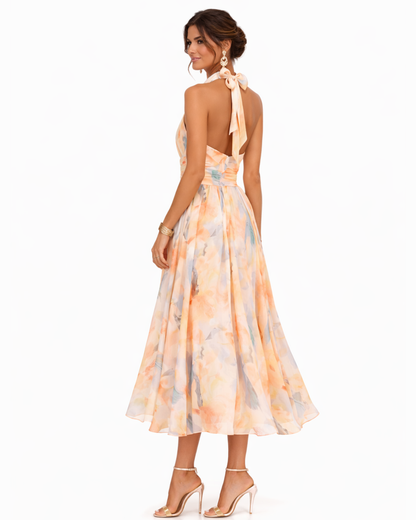 Dolores | Vestido largo fluido con cuello halter y estampado artístico