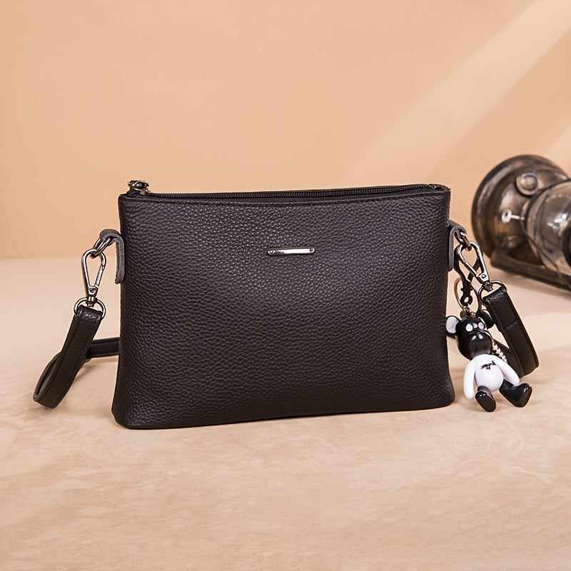 El elegante bolso bandolera de piel minimalista de Elena