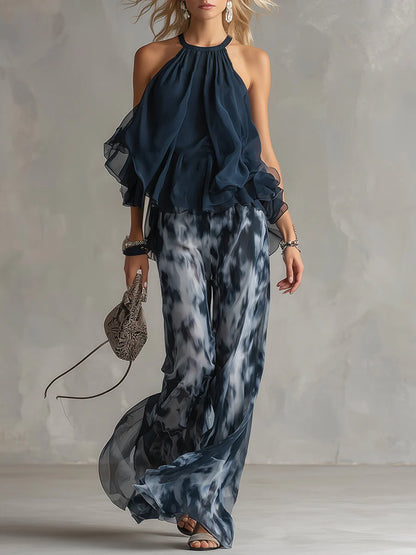 Ludovica - elegante vestido de gasa con corpiño de cuello alto y pantalón ancho estampado